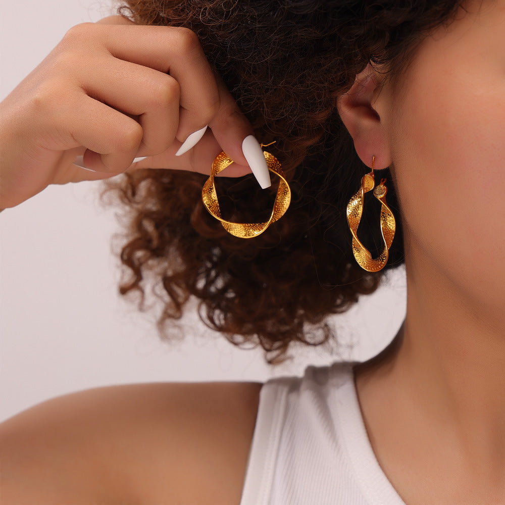 European And American Titanium Steel Metal Texture U-shaped Twisted Earrings